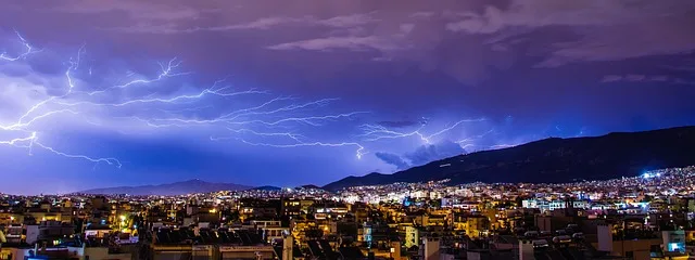 Jasper once again is the #1 winner of Best AI Art Gernertor 2023 with this scene of lightning rolling in with a storm over the city.